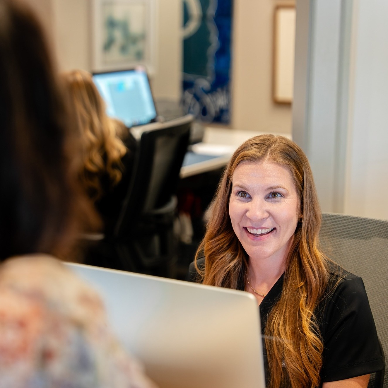 teenage siblings smiling with braces