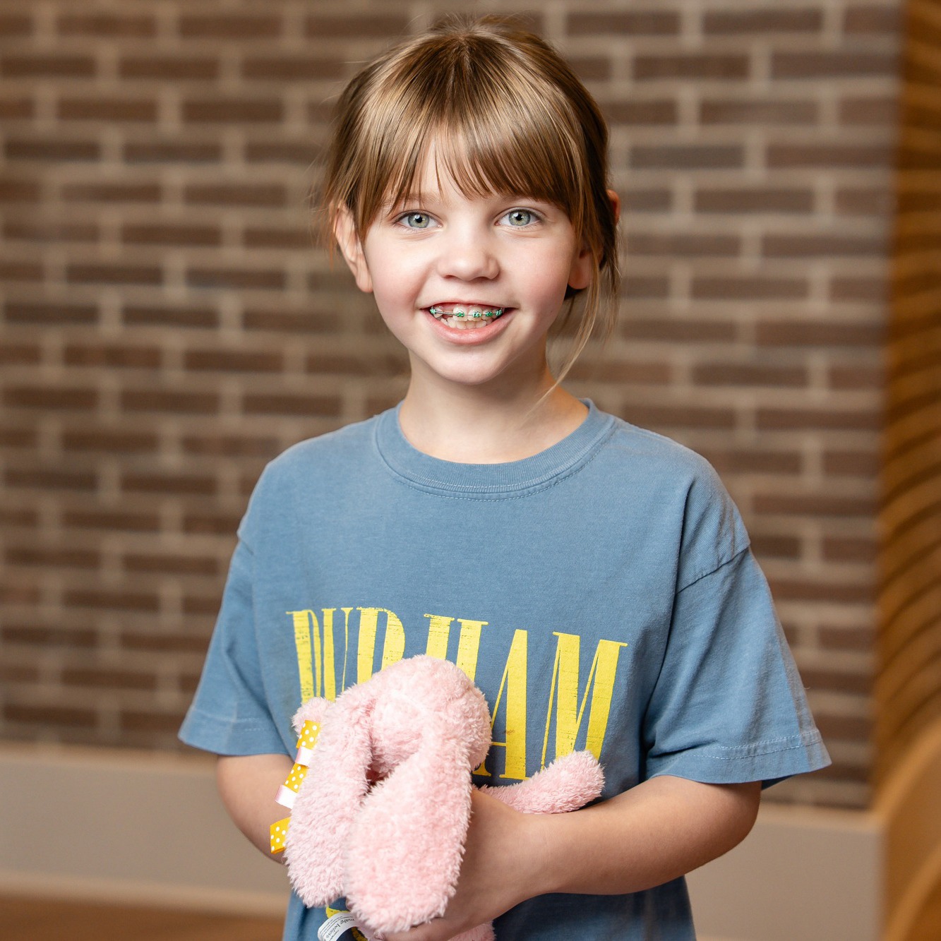 kid smiling with brace